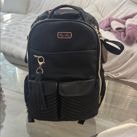 Itzy Ritzy Handbags - Itzy Ritzy Black boss Diaper Bag with Gold Accents